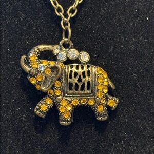 Elephant pendant with gold rhinestones